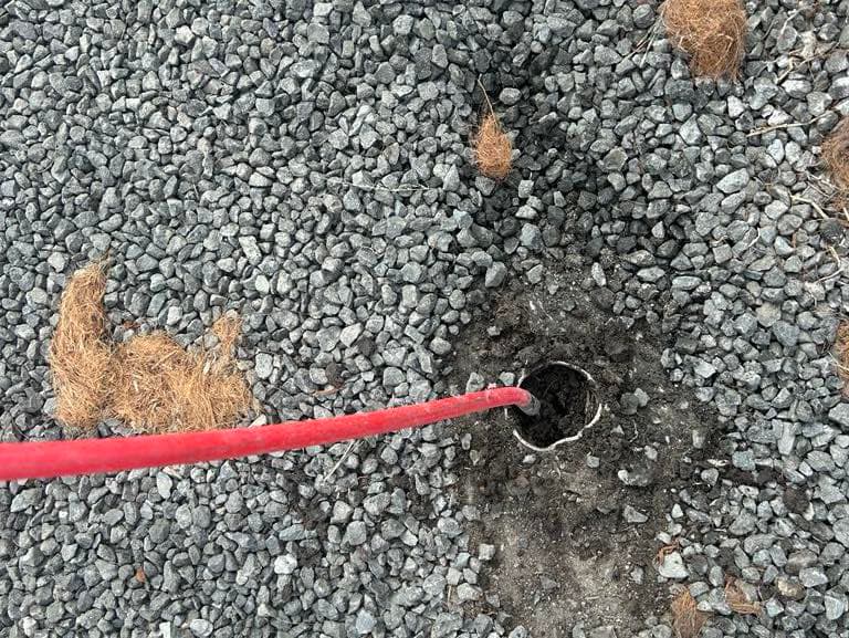 High-pressure jetter clearing a blocked drain, Platinum Plumbing Industries, Newcastle & Hunter
