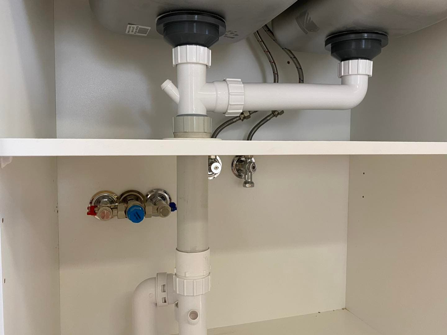 Under-sink pipe repair by Platinum Plumbing Industries